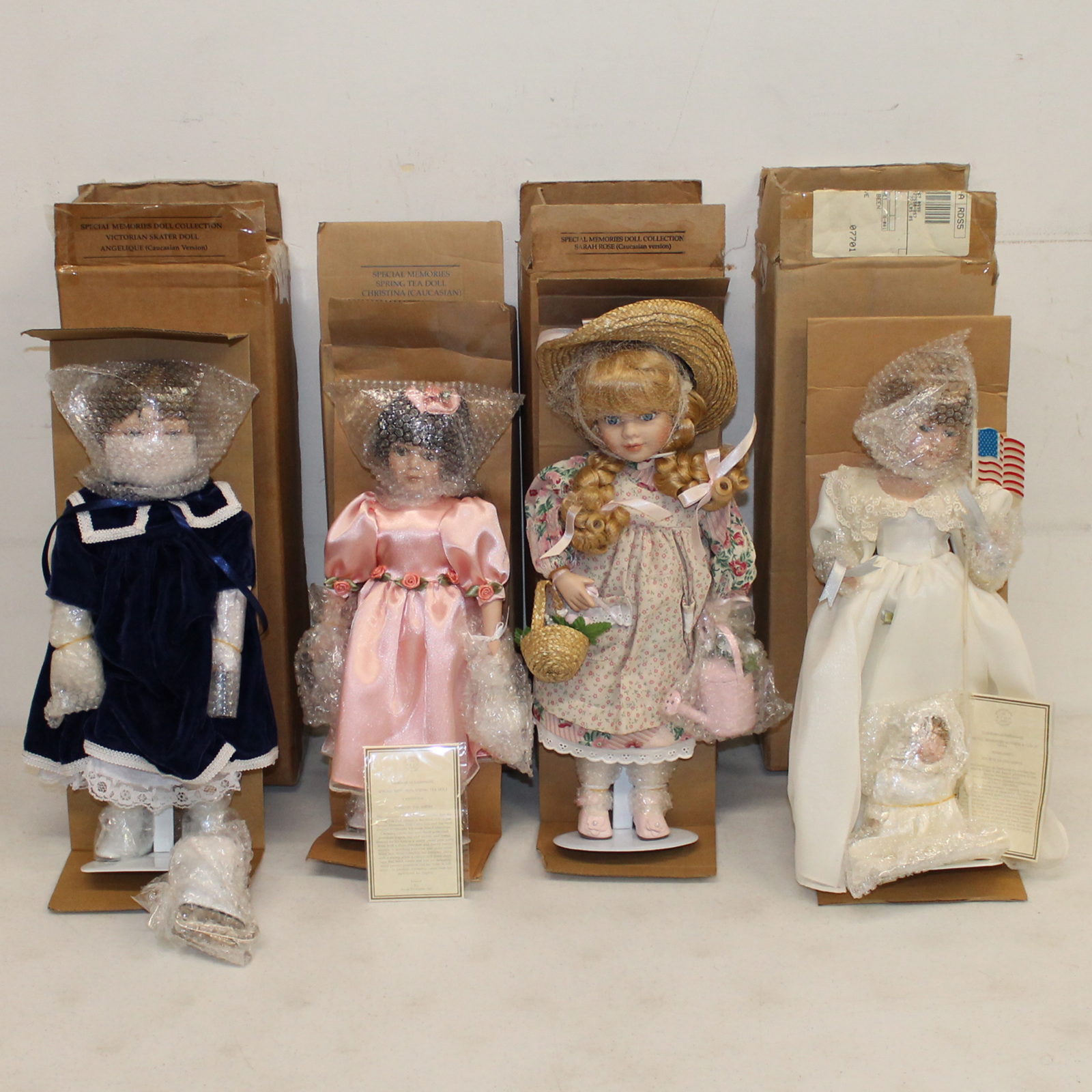 Lot of 4 Avon Porcelain Dolls Special 